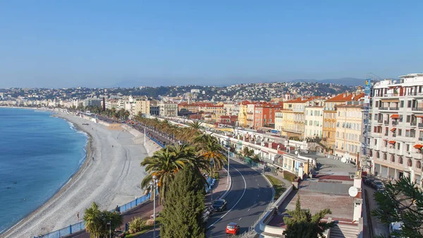 NICE, FRANCE, on JANUARY 9, 2017. The bright morning sun lights Promenade des Anglais - the main embankment of the city, one of the most beautiful in the world — Stock Photo, Image