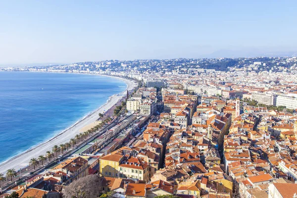 NICE, FRANCE, on JANUARY 9, 2017. The bright morning sun lights Promenade des Anglais - the main embankment of the city, one of the most beautiful in the world — Stock Photo, Image