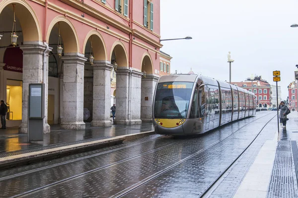NICE, FRANCE, on JANUARY 8, 2017. The modern high-speed tram goes on Massen Square, main in the city — Stock Photo, Image