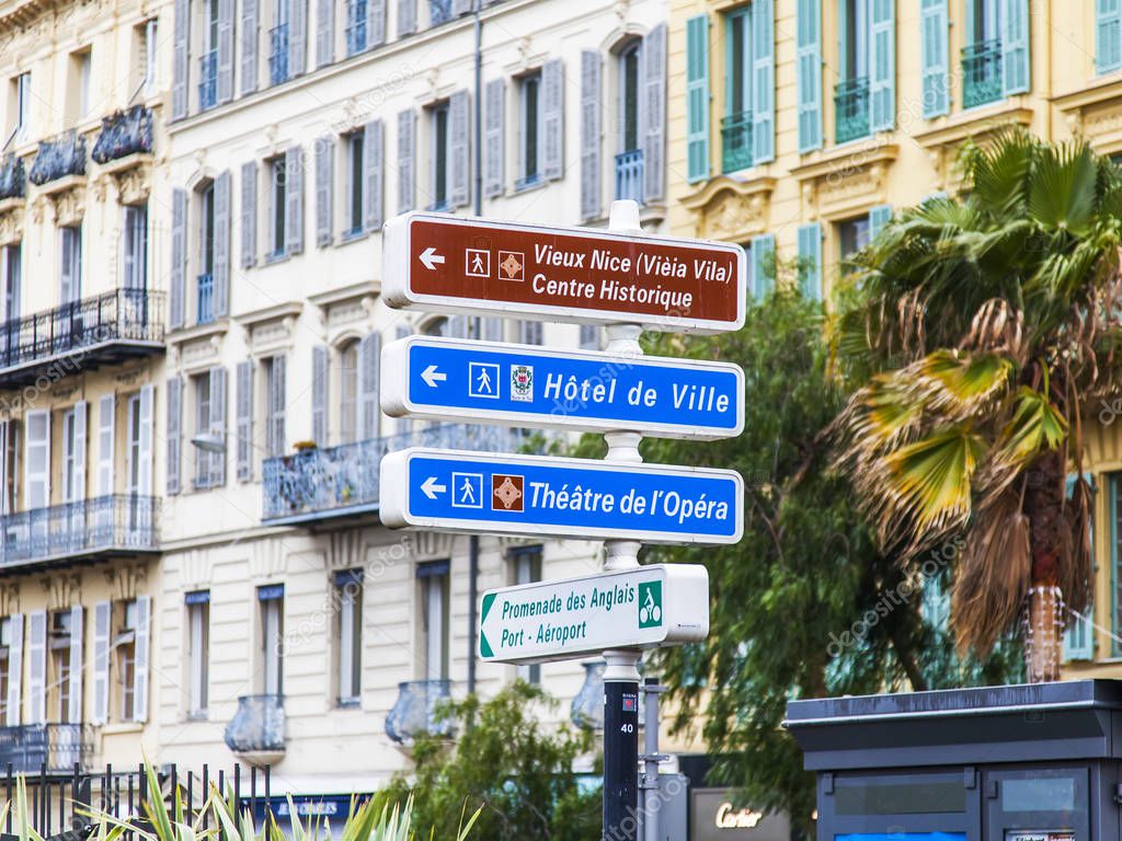 NICE, FRANCE, on JANUARY 9, 2017. Navigation elements on the city street specify the direction to sights