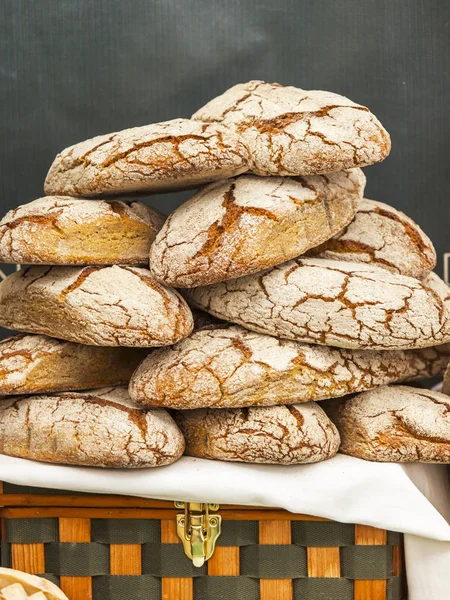 Tasty fresh bread on a counter in shop — Stock Photo, Image