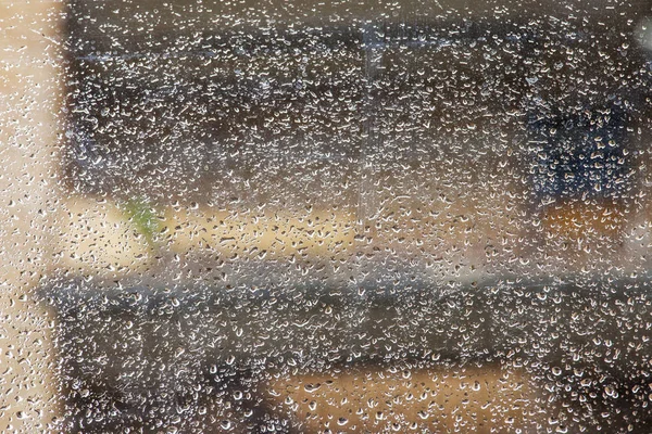 Wet glass with drops during a rain — Stock Photo, Image