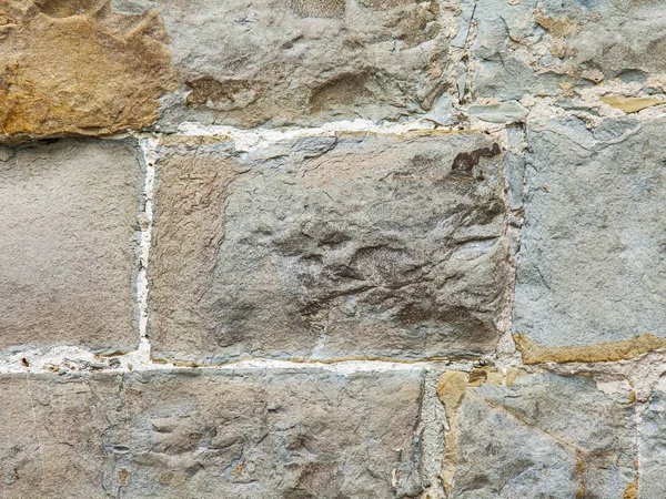 Surface of an old stone porous wall