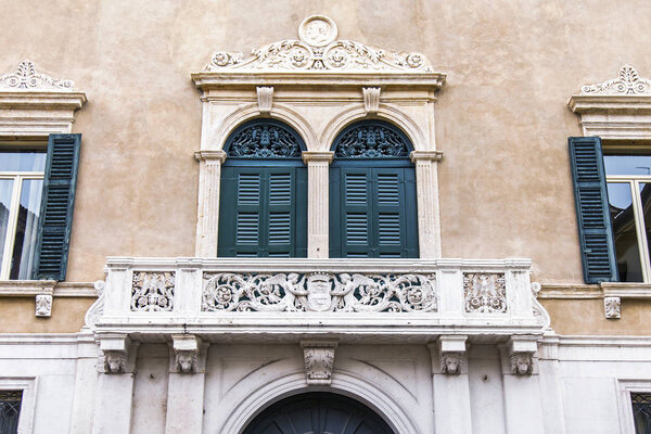 Verona, Italy, on April 24, 2019. Typical architectural details of a facade of the building in the old city.