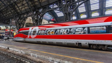 Milan, Italy, February 12, 2020. High-speed train near the platform of the Milano Centrale station clipart