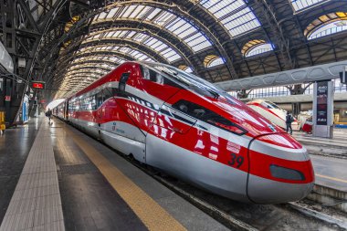 Milan, Italy, February 12, 2020. High-speed train near the platform of the Milano Centrale station clipart