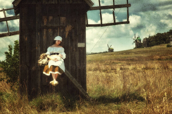 rustic woman in countryside 