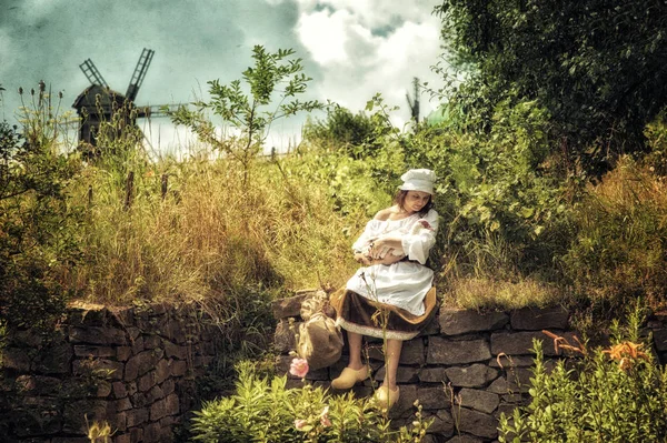 Rustic woman in countryside — Stock Photo, Image