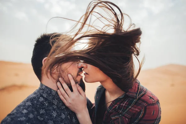 Romantic couple kissing at sunlight Stock Image
