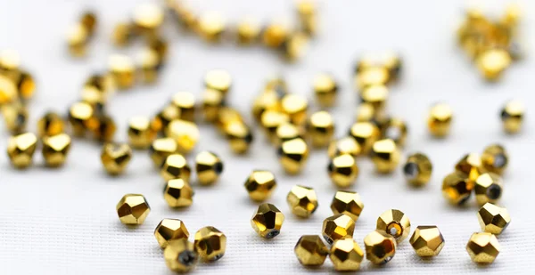 Perline di vetro dorato — Foto Stock