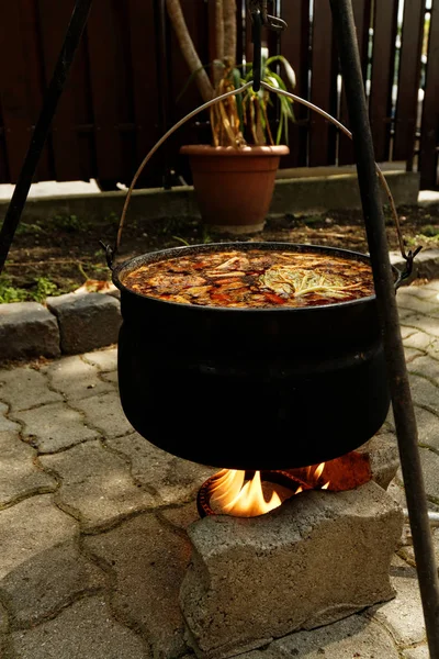 Goulash in cauldron — Stock Photo, Image