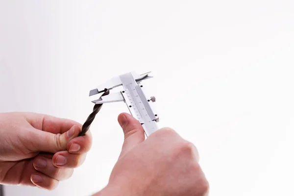 Digital Caliper in a man — Stock Photo, Image