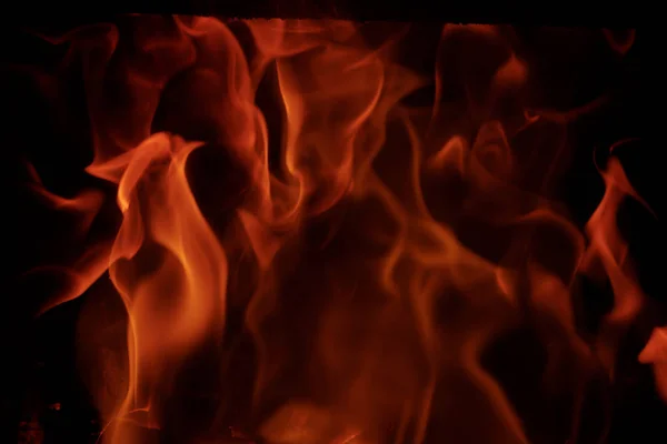 Fire flames - zblízka fotografie — Stock fotografie