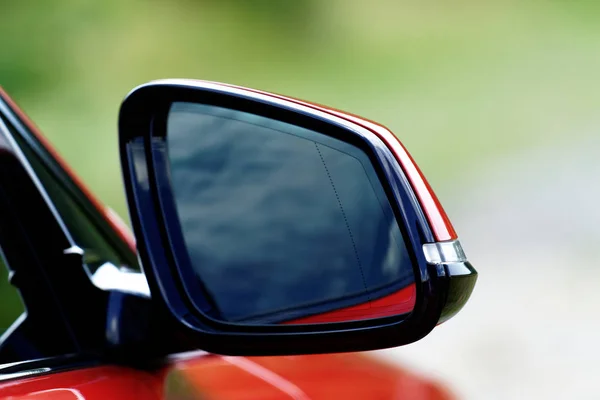 Red sports car rearview mirror — Stock Photo, Image