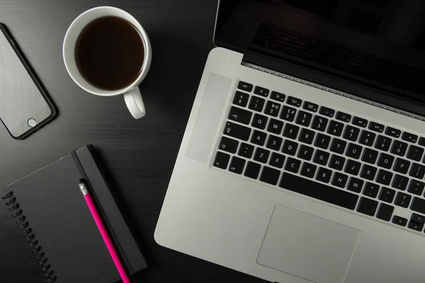 Desk with computer, coffee and notebook — Stock Photo, Image