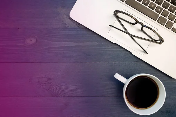 Laptop computer keyboard, eyeglasses and coffee — Stock Photo, Image