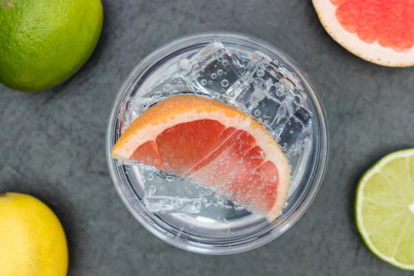 Pink gin tonic vodka soda fruit grapefruit cocktail drink in gla Stock Picture