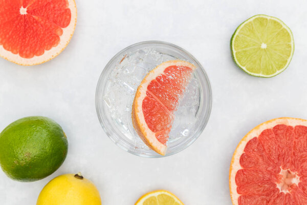 Pink gin tonic vodka soda fruit grapefruit cocktail drink in gla