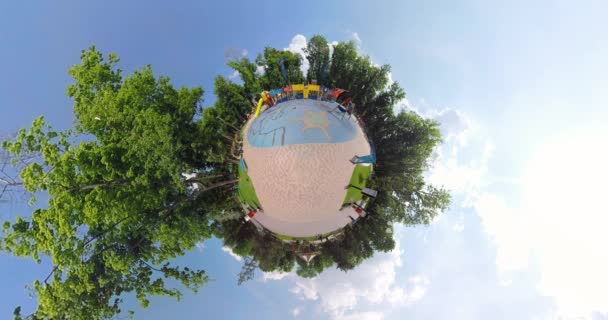 Tiny planet  child's playground in the park — Stock Video