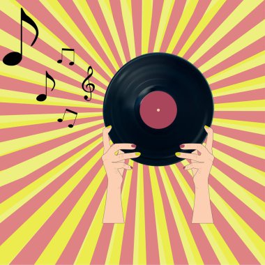 Bir vinil kaydı tutan kadın 