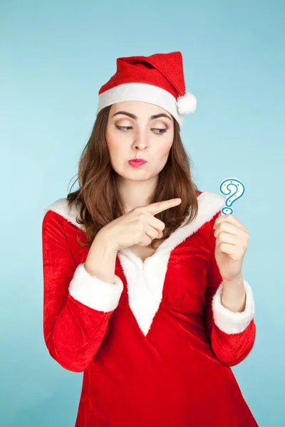 Kobieta w stroju Boże Narodzenie myśląc o prezenty — Zdjęcie stockowe