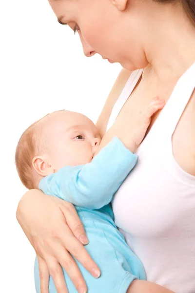 Foto de madre feliz dándole de mamar a su adorable bebé —  Fotos de Stock