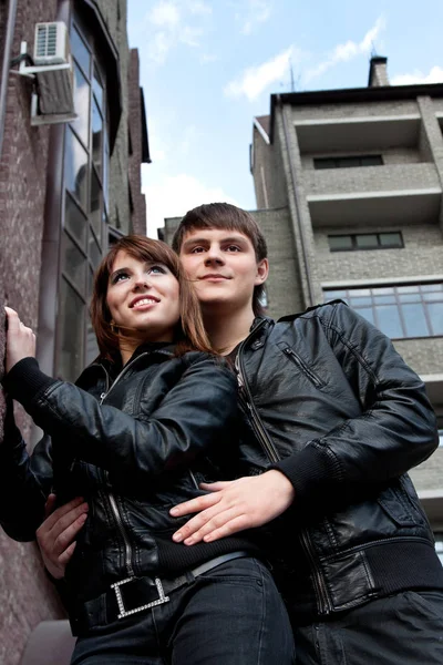 Photo of smiling woman and man outdoors — Stock Photo, Image