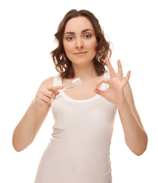 Mujer con cepillo de dientes y pasta de dientes — Foto de Stock