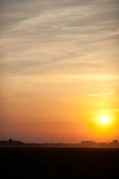 City silhouette against the sky on a sunset