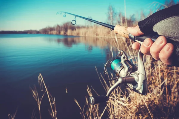 Fishing with rod on lake — Stock Photo, Image