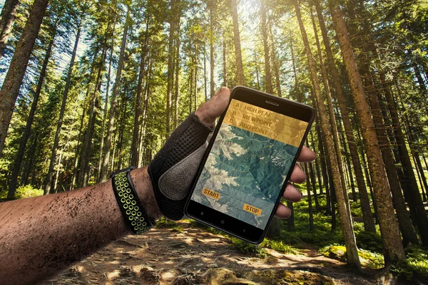 Smartphone GPS navigator in mans hand. — ストック写真