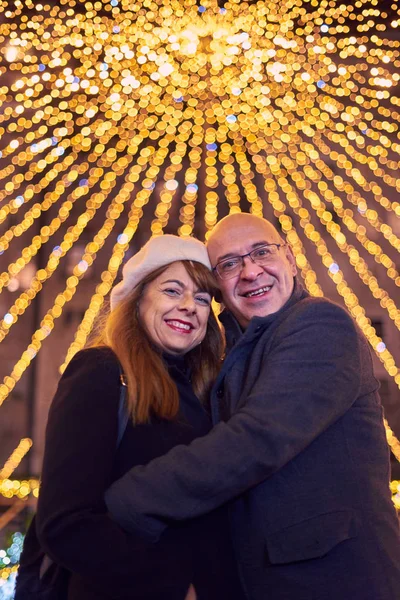 Couple enjoying Christmas Lights — 스톡 사진