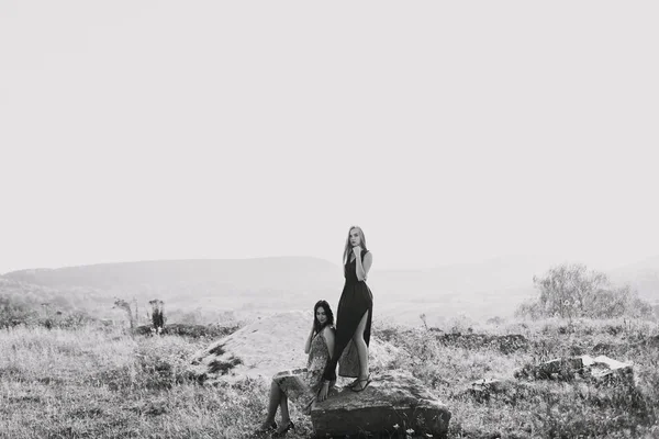 beautiful girls walking in mountains