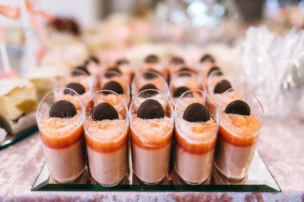 Wedding sweet table with desserts and cakes. A beautiful wedding reception