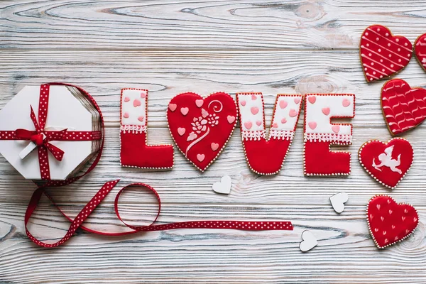 Festive Composition Red Glazed Cookies Love Lettering Ribbon Box Wooden — Stock Photo, Image