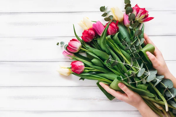 Woman Holding Tulip Bouquet Hands Wooden Planks Background — Stock Photo, Image