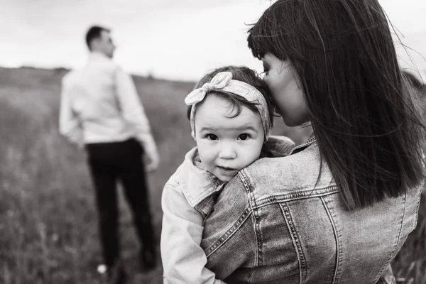 Cropped View Woman Holding Kissing Little Girl Man Standing — Stock Photo, Image