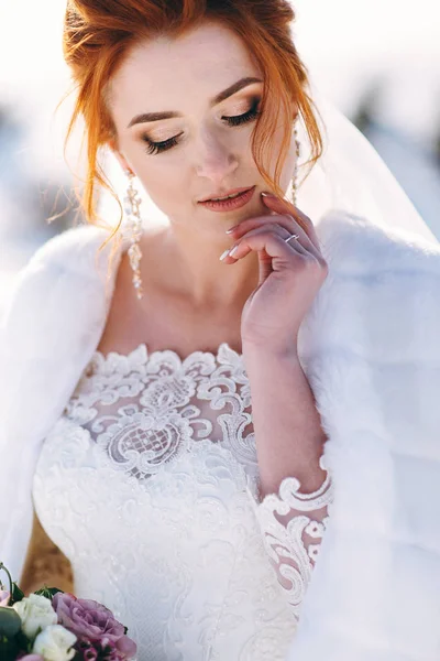 Portrait of bride enjoying time in winter day