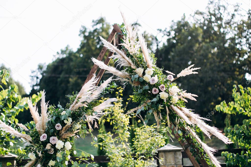 Wedding decoration rustic style. Floral decor ceremonie place boho style
