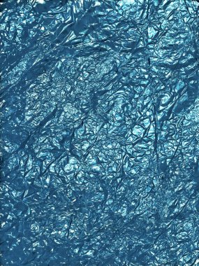 Aqua menthe renk buruşmuş kağıt folyo doku arkaplan.