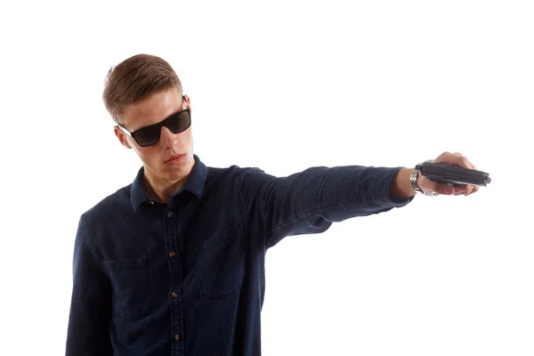 Formal man with a gun — Stock Photo, Image