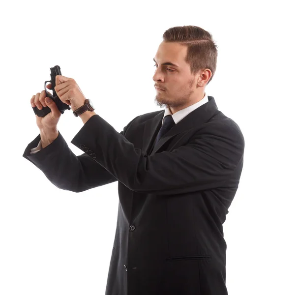 Man förbereder en pistol — Stockfoto