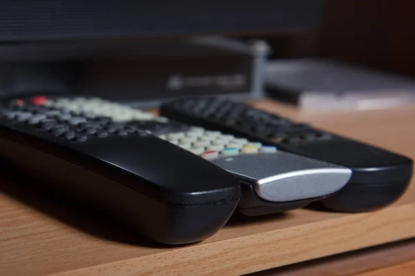 Three remote controls — Stock Photo, Image