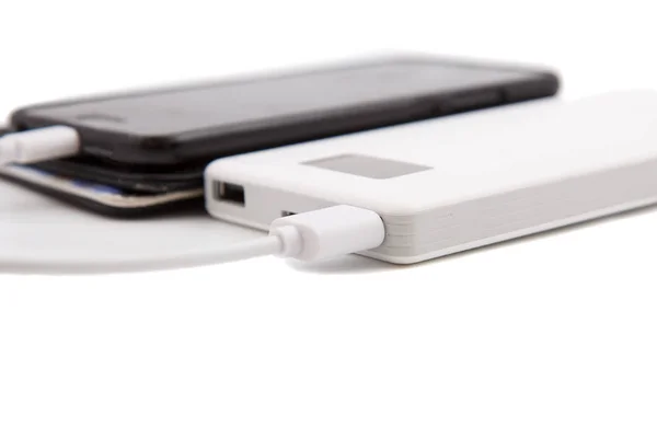 Power bank charges a smartphone — Stock Photo, Image