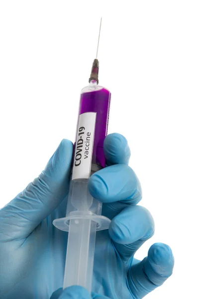 Doctor holding syringe with virus COVID 19 vaccine. — Stock Photo, Image