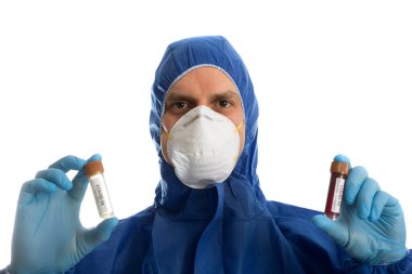 Blood test tube and vaccine in doctor hand,