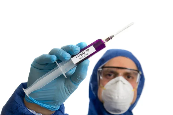 Doctor holding syringe with virus COVID 19 vaccine. — Stock Photo, Image