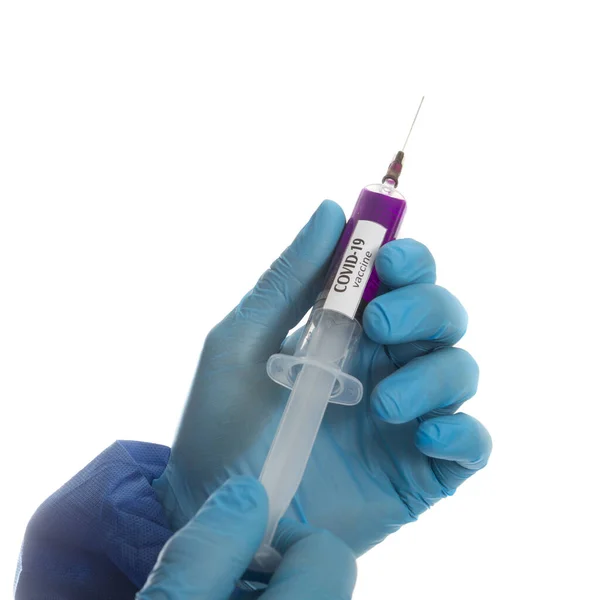 Doctor holding syringe with virus COVID 19 vaccine. — Stock Photo, Image