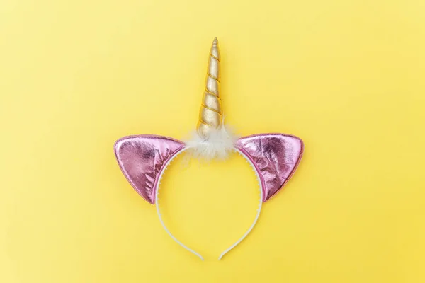 Stock image Halloween party accessory unicorn horn hairband isolated on yellow colorful background