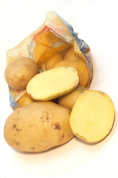 Κίτρινος Κόνδυλος Πατάτας Ζυμαρικών Κόκκινη Δικτυωτή Τσάντα — Φωτογραφία Αρχείου